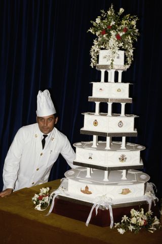 Chief petty officer cook David Avery with the royal wedding cake made for Prince Charles and Princess Diana's wedding, 29th July 1981.