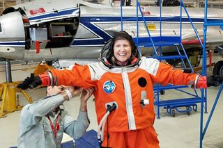 A parabola participant is suited up prior to flight, at the National Research Council in Ottawa, Canada.