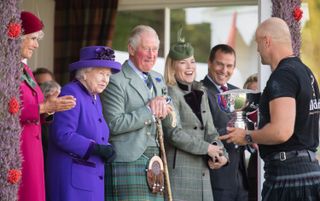 Camilla, Duchess of Cornwall, Queen Elizabeth II, Prince Charles, Prince of Wales, Autumn Phillips and Peter Phillips attend the 2019 Braemar Highland Games on September 07, 2019 in Braemar, Scotland.