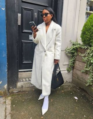 Remy wearing Asos coat