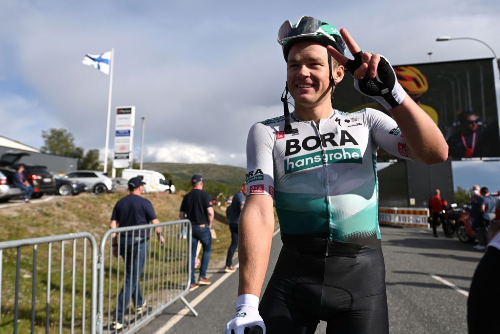 KILPISJARVI FINLAND AUGUST 06 Martin Laas of Estonia and Team Bora Hansgrohe celebrates at finish line as at stage winner during the 8th Arctic Race Of Norway 2021 Stage 2 a 178km stage from Nordkjosbotn to Storfjord Kilpisjrvi Finland ArcticRace on August 06 2021 in Kilpisjarvi Finland Photo by Stuart FranklinGetty Images