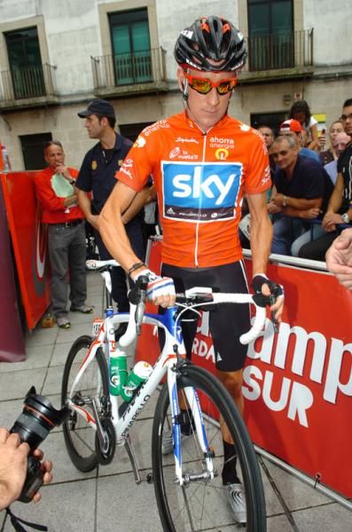 Bradley Wiggins (Sky) sets off on his first day in the red jersey.