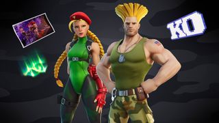 Cammy and Guile stood next to each other on a grey camo background with their KO and Borealis Backer backblings on display