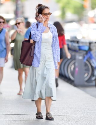 Katie Holmes wears a Bevza sundress with a button down shirt fisherman sandals and a madewell bag in new york city