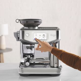 A Sage coffee machine in a kitchen