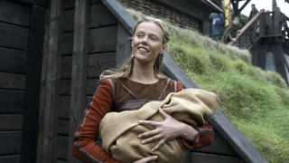 freydis holding happily her baby in jomsborg