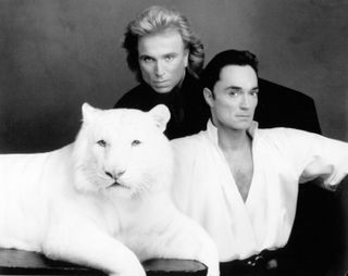 Siegfried and Roy circa 1970 with one of their tigers