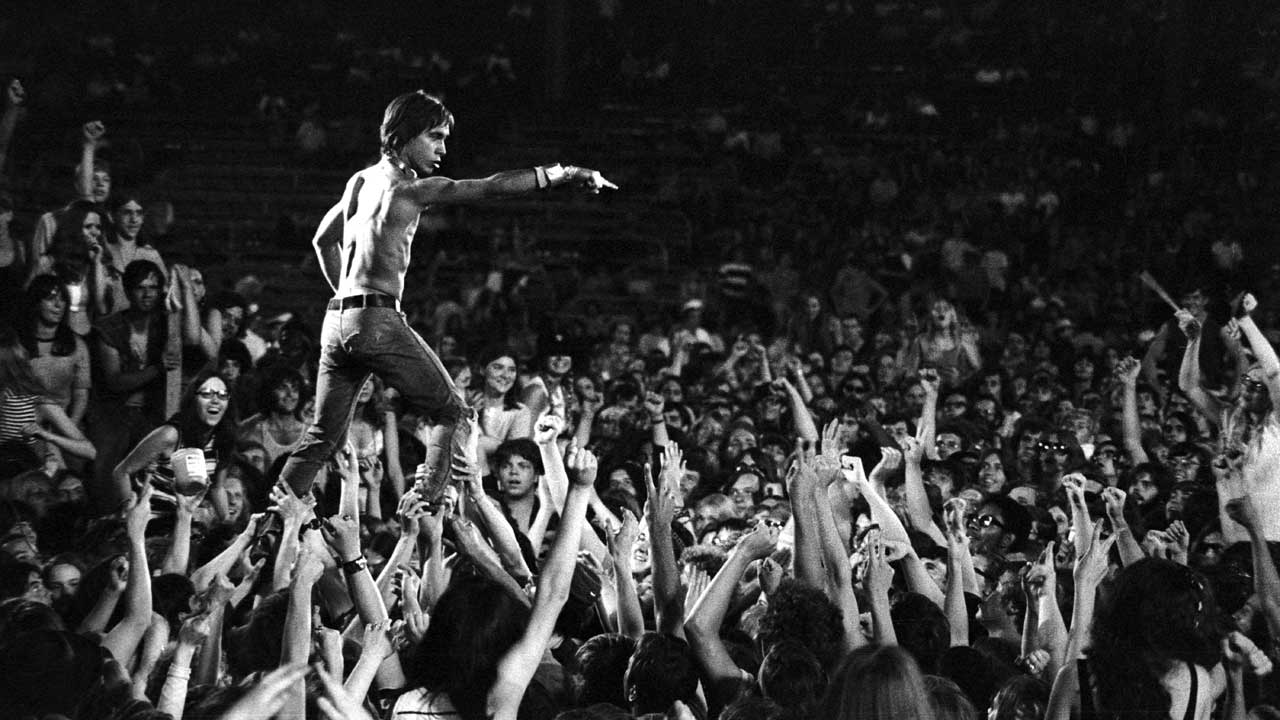Iggy Pop LiveIggy Pop of the Stooges rides the crowd during a performance at the Cincinnati Pop Festival at Crosley Field, Cincinnati, Ohio, 13th June 1970