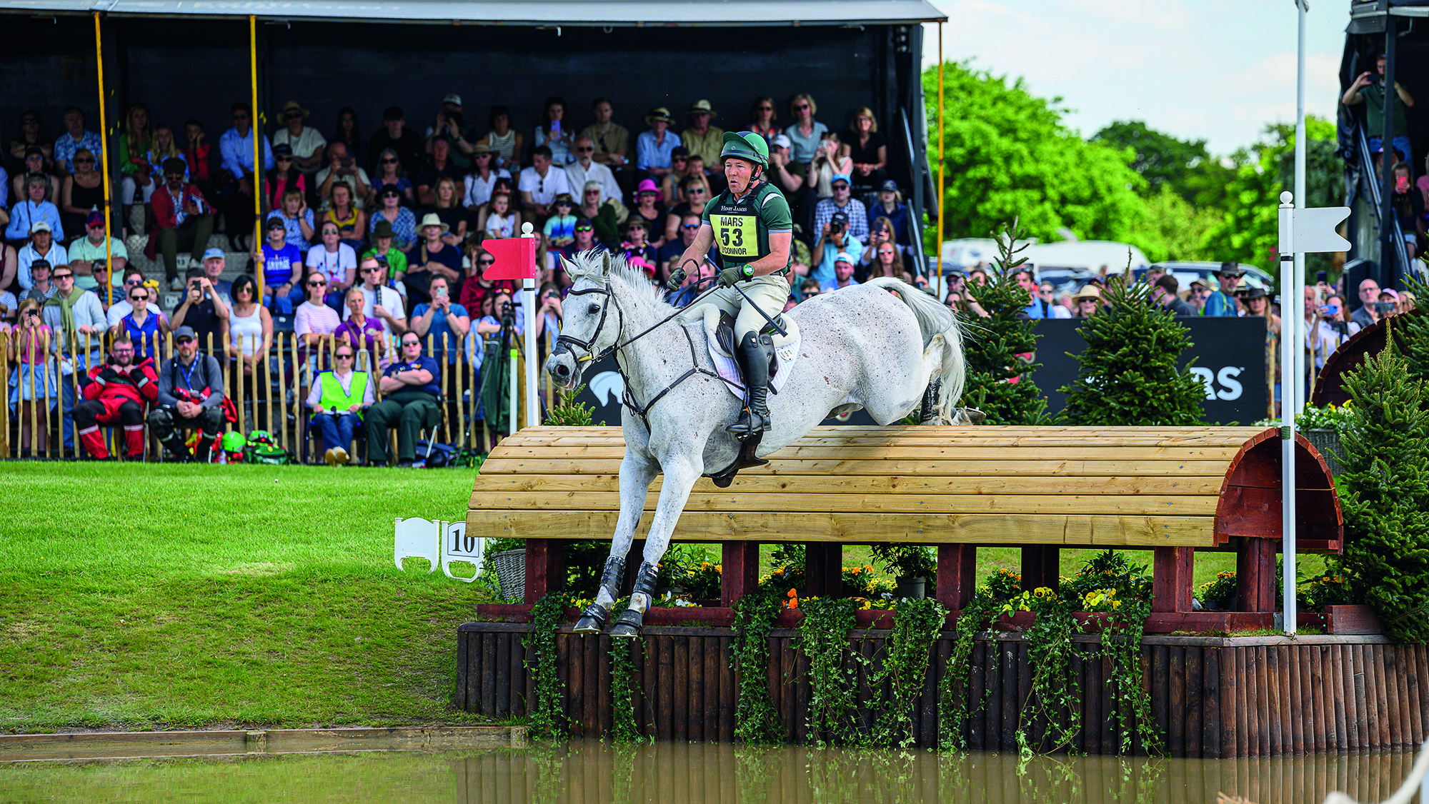 Austin O&amp;rsquo;Connor and Colorado Blue jump into The Lake at Badminton Horse Trials 2025.