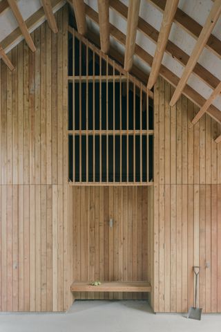 Wraxall Yard interior with timber wall