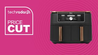 A Ninja Foodi Max Air Fryer on a pink background with text saying Price Cut next to it.