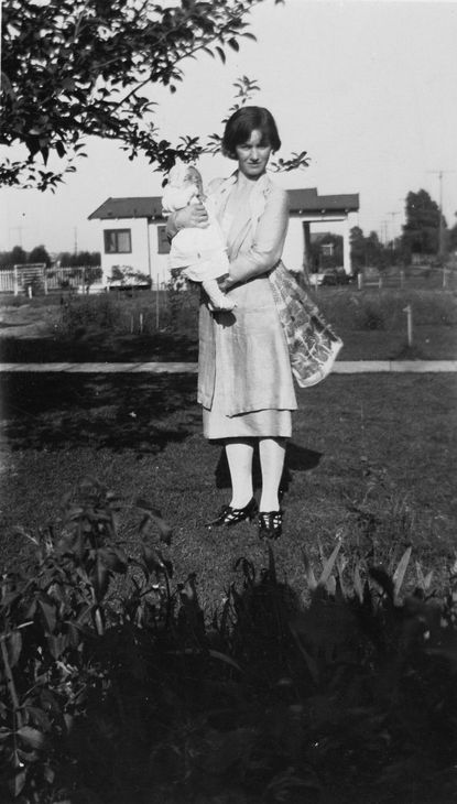 1926: Being held by her mom
