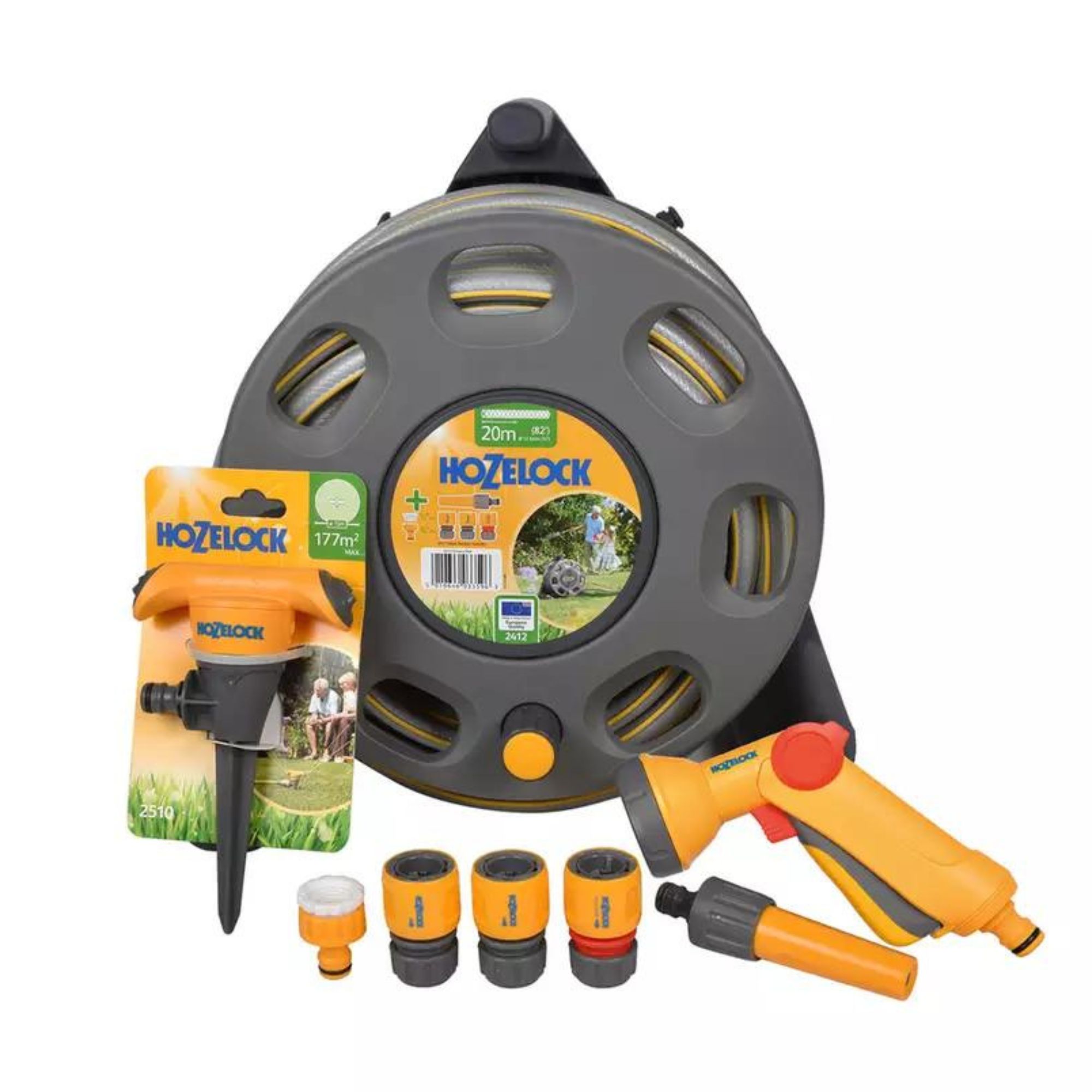 Hozelock hose wound around the reel sitting next to all of the accessories, from a spray gun to different nozzles