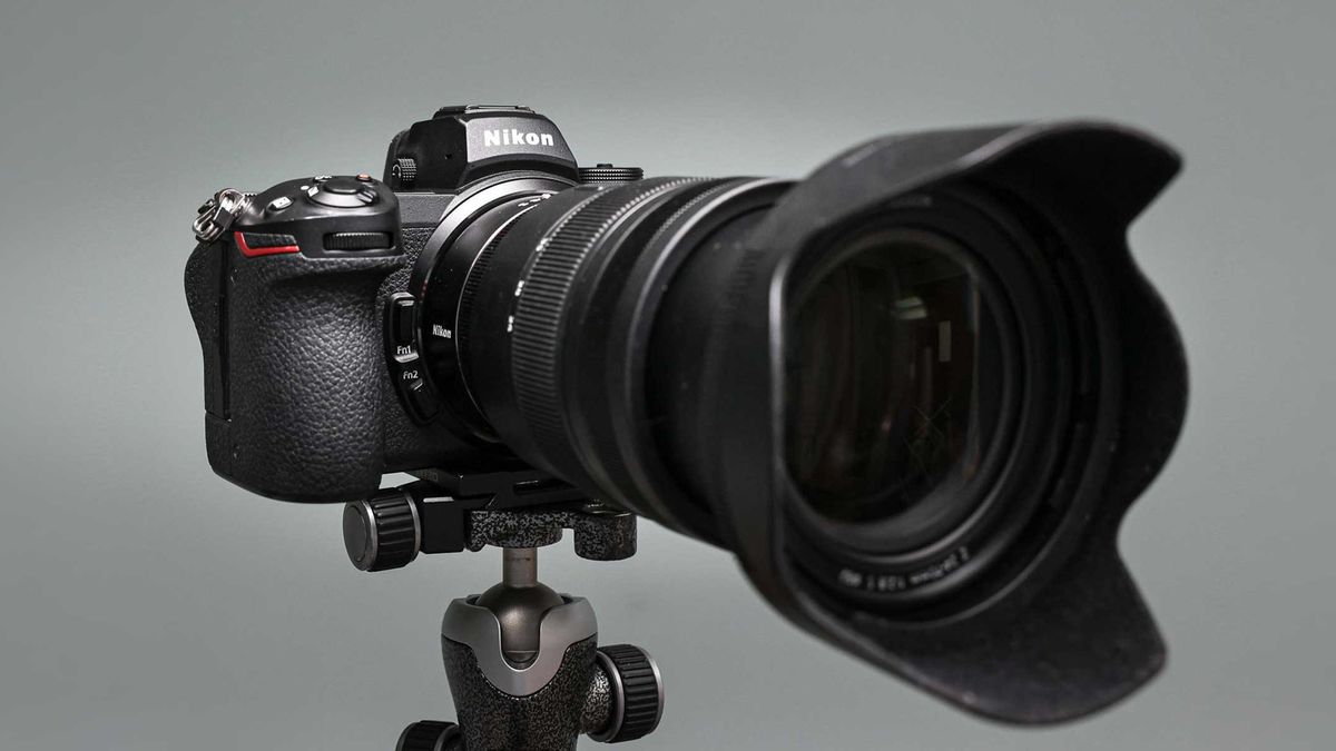 Nikon Z7 II camera on tripod with telephoto lens attached.