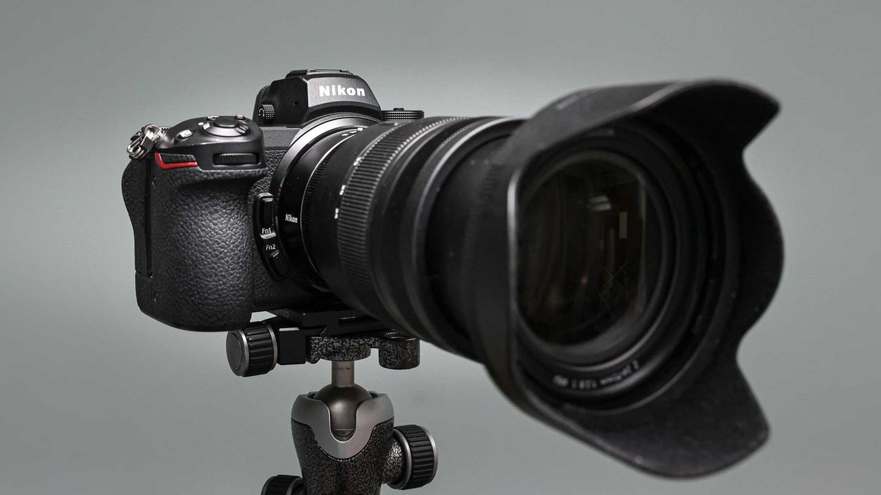 Nikon Z7 II camera on tripod with telephoto lens attached.