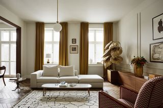 OPen plan living room with neutral color scheme