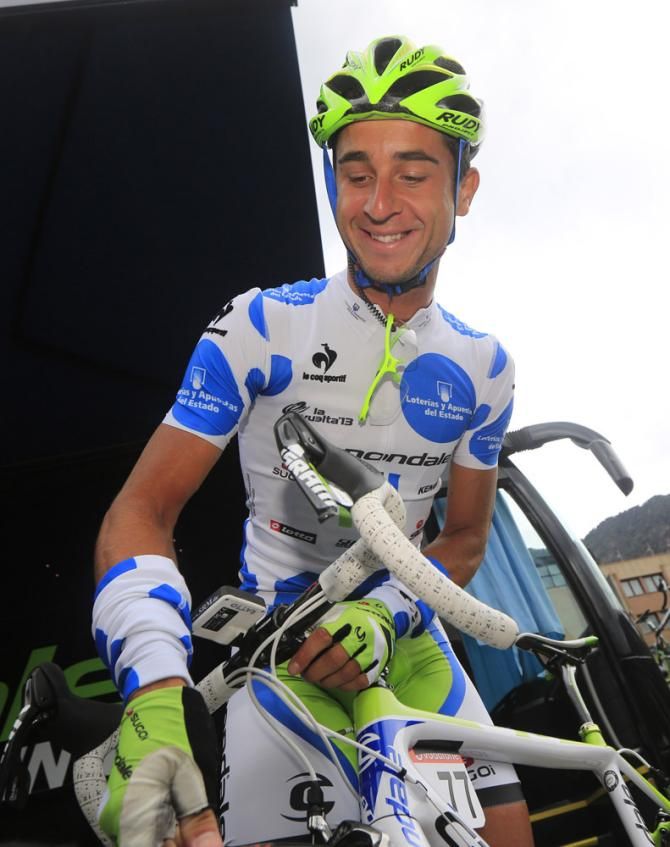 Stage 14 winner Daniele Ratto (Cannondale) starts stage 15 in the mountain classification leader's jersey