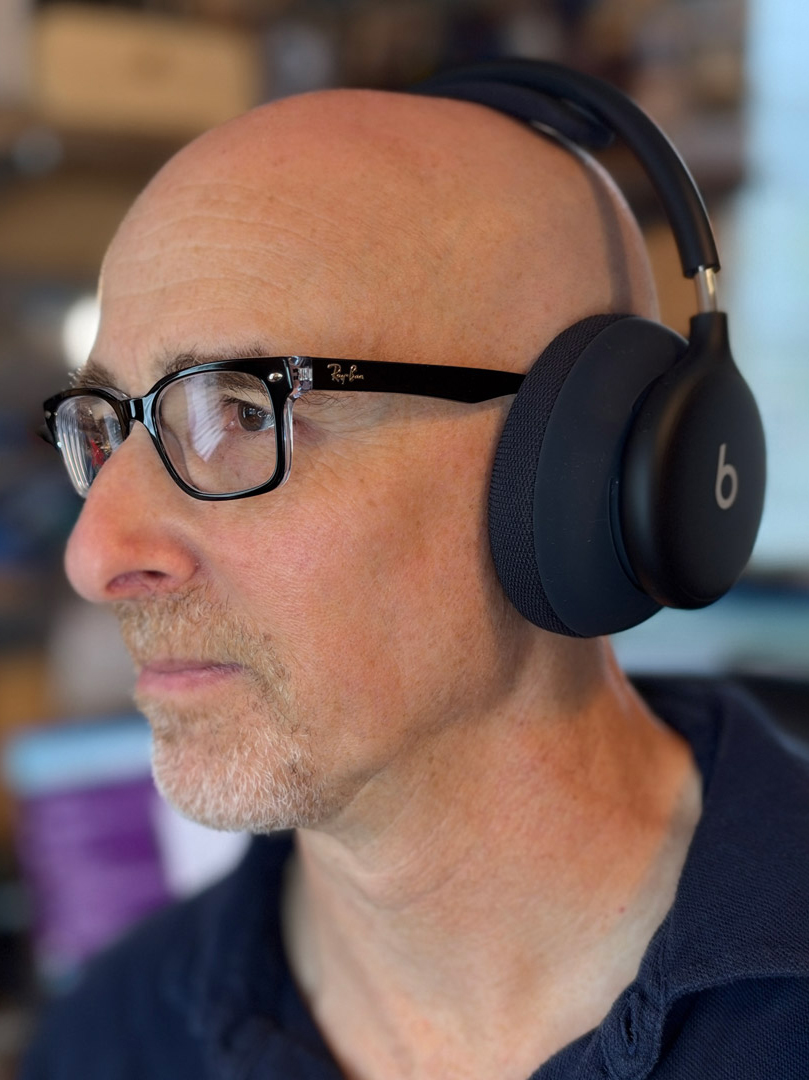 Writer wearing Beats 360 headphones