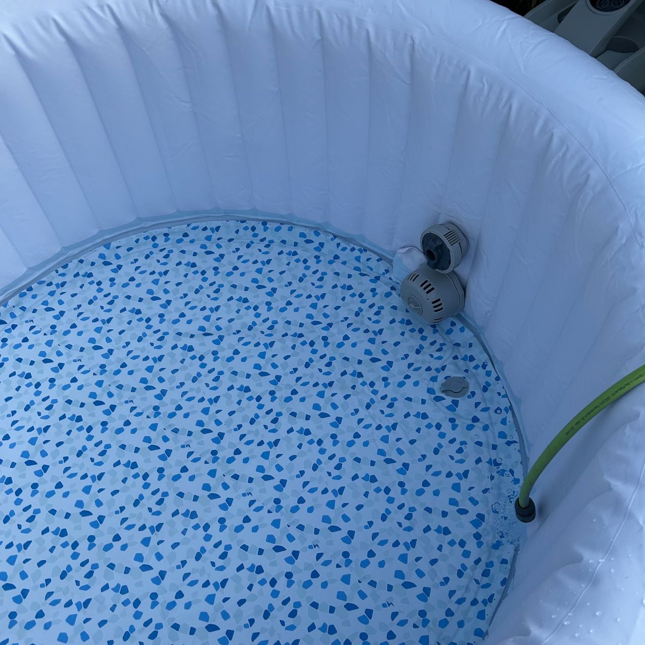 Lay-Z-Spa Miami AirJet with hose inside filling with water
