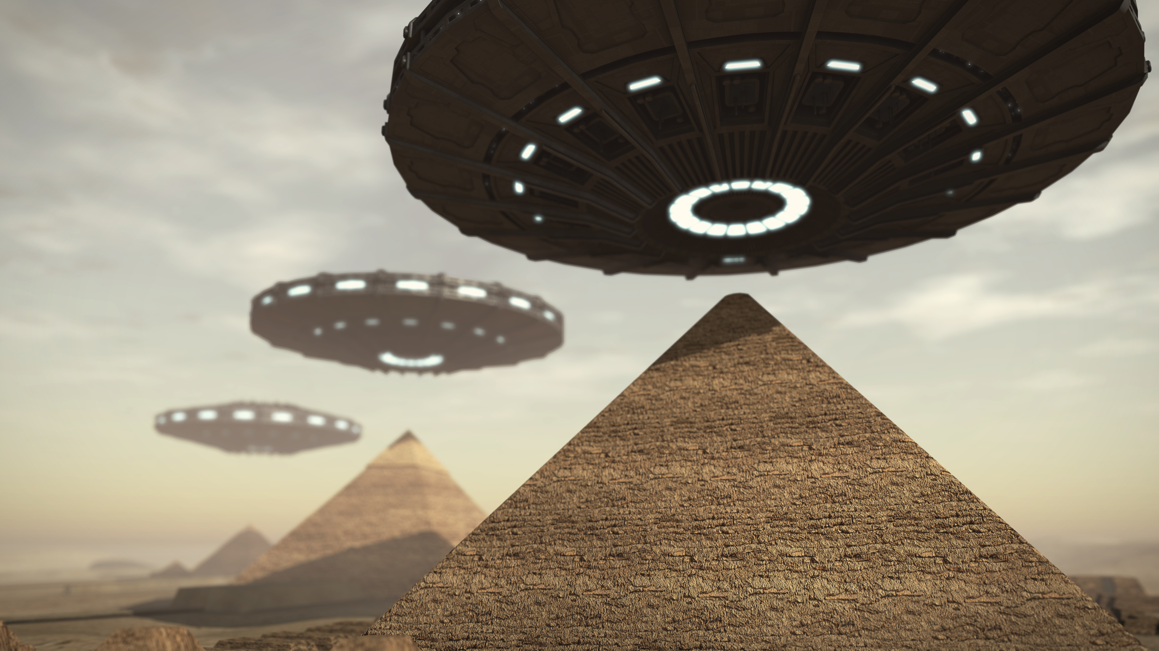 ufos hovering over egyptian pyramids