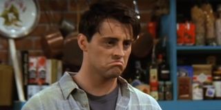 joey grimacing on friends