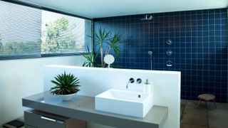 Contemporary bathroom with blue tiles in linear pattern