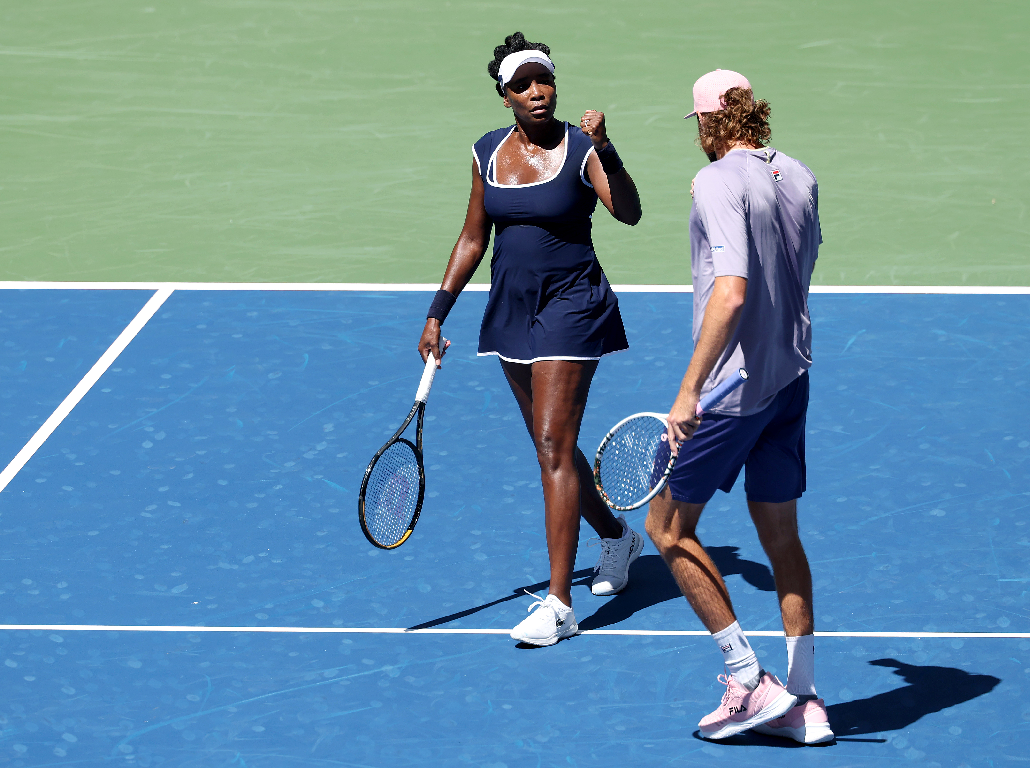 NEW YORK, NEW YORK - AUGUST 19: The doubles team of Venus Williams and Reilly Opelka of the United States react during the mixed doubles first round match against Karolina Muchova of the Czech Republic and Andrey Rublev at USTA Billie Jean King National Tennis Center on August 19, 2025 in New York City.