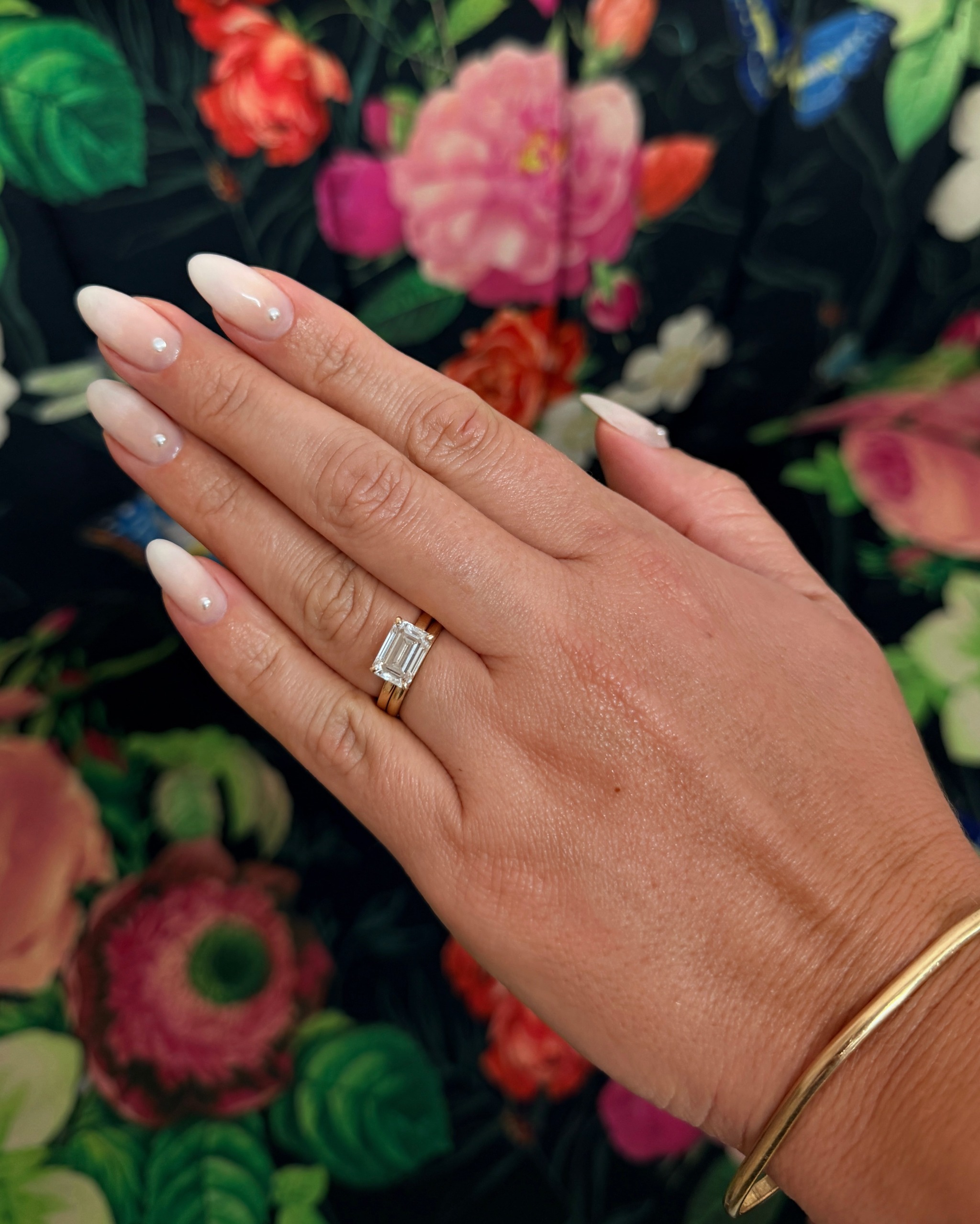 Gradient pearl engagement nails.