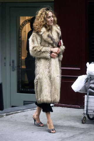 Carrie Bradshaw wearing fur coat