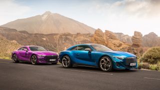 Purple and blue Bentley Batur cars with mountain backdrop