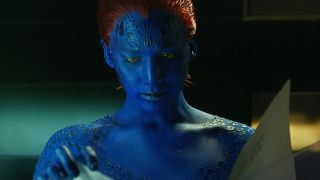 Jennifer Lawrence reviews a file while shown in her Mystique form in X-Men: Days of Future Past.