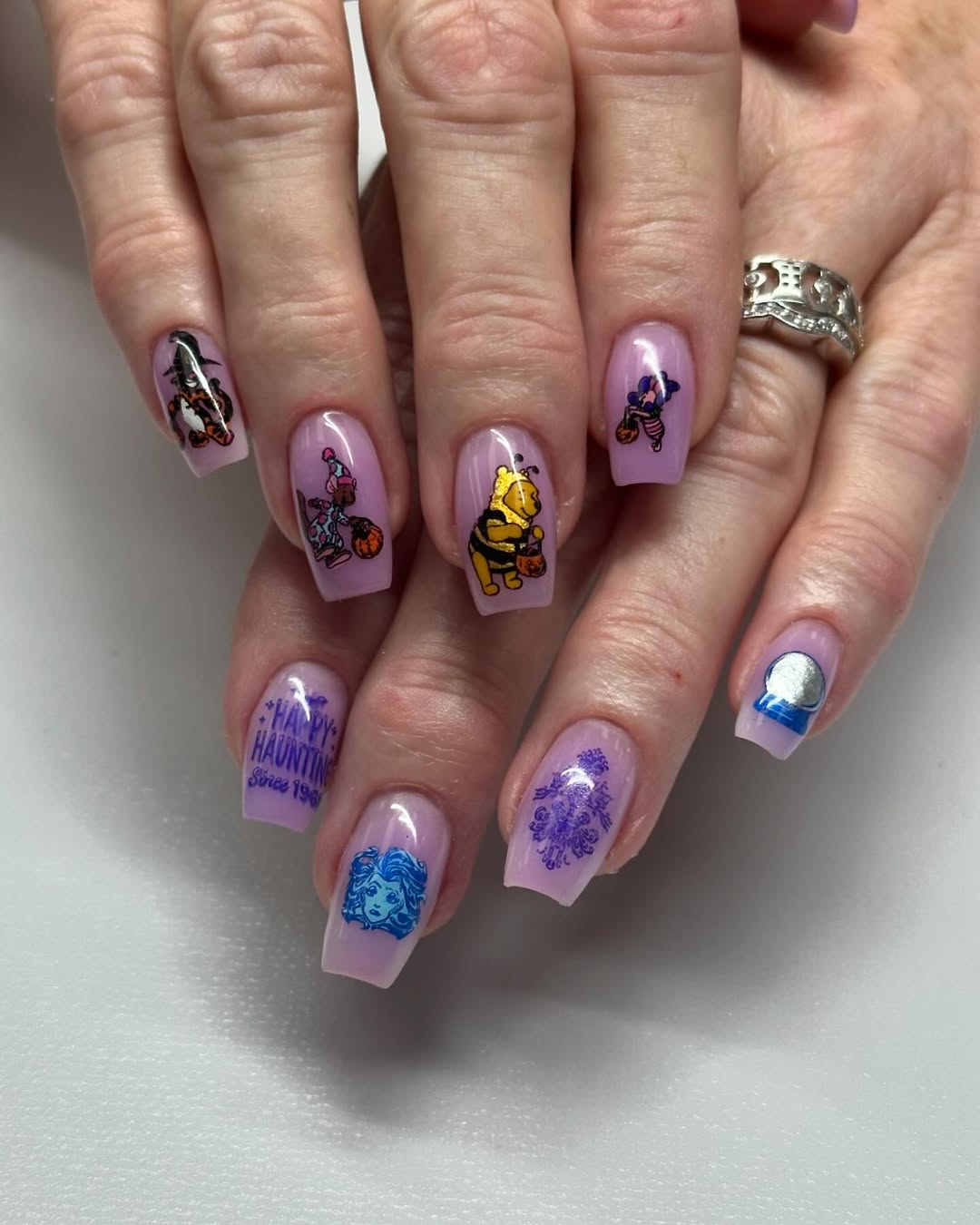 purple winnie the pooh halloween nails
