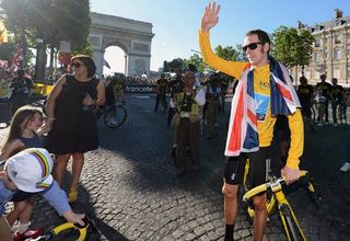 Bradley Wiggins was joined by his wife and children on the Champs-Élysées at the Tour's conclusion.