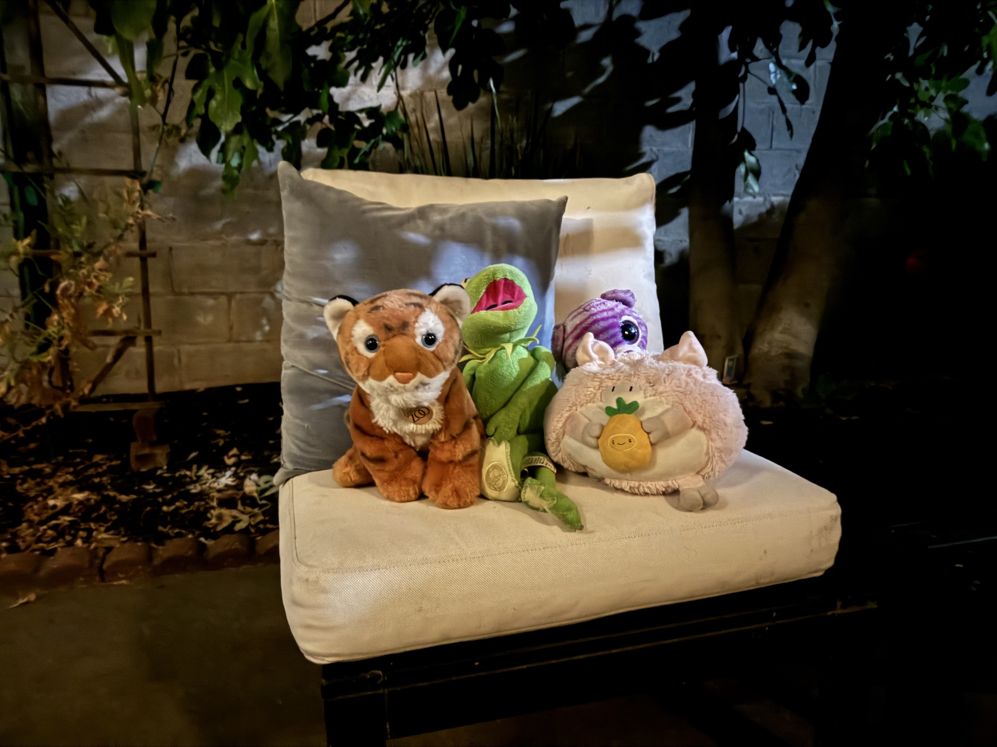 photo of stuffed animals at night captured by iPhone 15 Pro