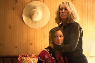 laurie strode holds her adult daughter in the halloween reboot