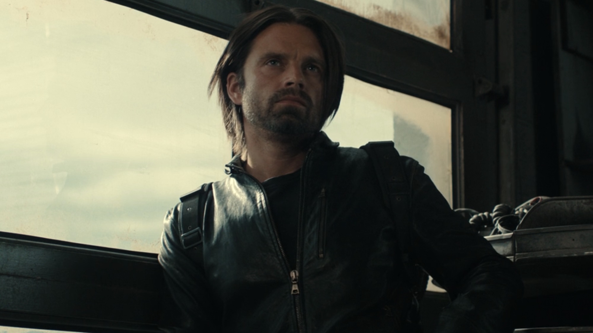 Bucky wearing a leather jacket in Thunderbolts' garage scene.