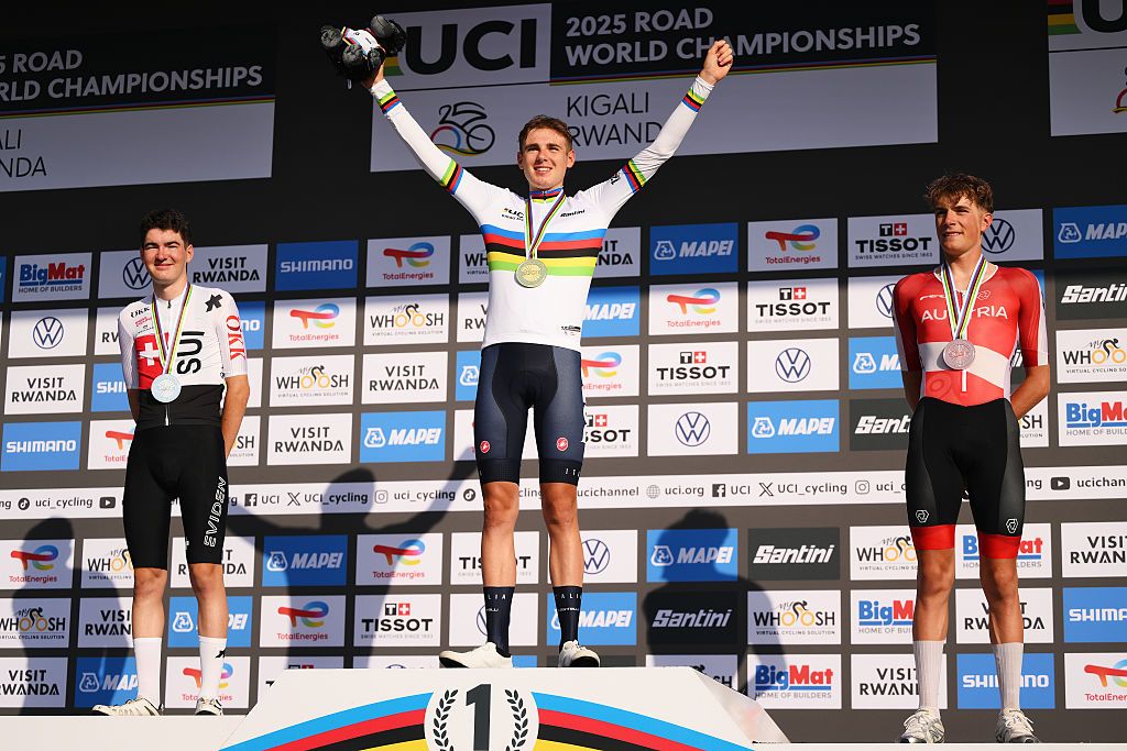 KIGALI, RWANDA - SEPTEMBER 26: Gold medalist Lorenzo Finn and Team Italy (C), Silver medalist Jan Huber and Team Switzerland (L) and Bronze medalist Marco Schrettl and Team Austria (R) pose on the podium during the 98th UCI Cycling World Championships Kigali 2025, Men Under 23 Road Race a 164.6km race from Kigali to Kigali on September 26, 2025 in Kigali, Rwanda. (Photo by David Ramos/Getty Images)