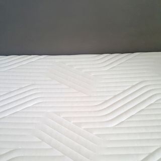 A close up of the Tempur Sensation Elite mattress showing it's ridged surface pattern