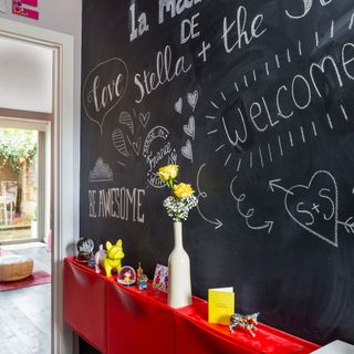 Hallway with chalkboard painted wall for messages and doodles