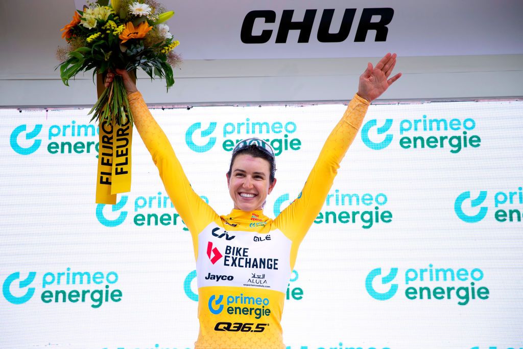 CHUR SWITZERLAND JUNE 20 Kristen Faulkner of The United States and Team BikeExchange Jayco celebrates winning the yellow leader jersey on the podium ceremony after the 2nd Tour de Suisse Women 2022 Stage 3 a 1242km stage from Vaduz to Chur on June 20 2022 in Chur Switzerland Photo by Heinz ZwickyGetty Images