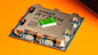 A close-up photo of an AMD Zen 4 CCD chiplet resting on top of an unidentifiable Ryzen 7000-series X3D processor, as shot by Fritzchens Fritz