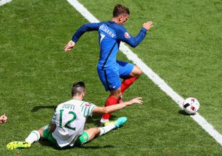 Republic of Ireland defender Shane Duffy brings down France attacker Antoine Griezmann in the teams' last-16 clash at Euro 2016.