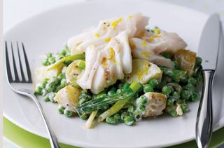 Steamed cod with warm new potato and pea salad