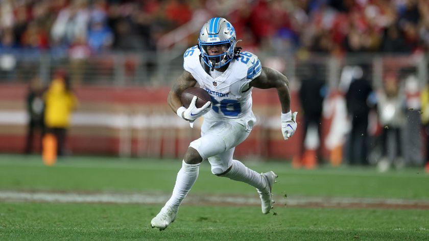 Jahmyr Gibbs of the Detroit Lions runs with the ball during an NFL match