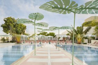 Goodtime Hotel pool with pastel pink and green