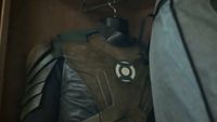 Hal Jordan's brownish Green Lantern uniform hanging in a closet