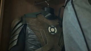 Hal Jordan's brownish Green Lantern uniform hanging in a closet