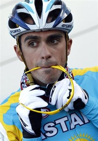 Astana's Alberto Contador adjusts his helmet prior to a training ride in Calpe, Spain.