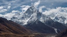 A picture of snowy peaks in the Himalayan mountain system.