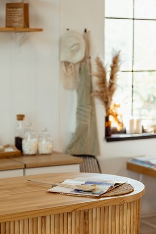 A small kitchen with a bamboo island